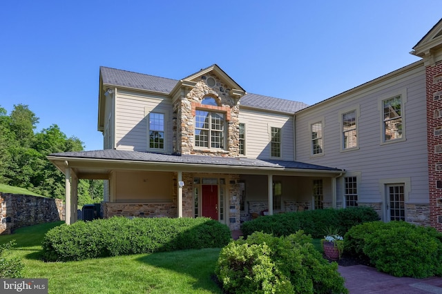 5751 Mount Pisgah Rd, York, PA 17406 - view of front facade with stone siding, a front yard, and covered porch
