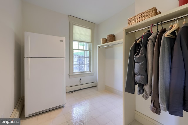 5751 Mount Pisgah Rd, York, PA 17406 - walk in closet with baseboard heating and light tile patterned flooring