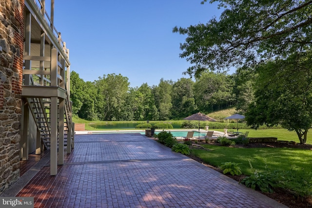 5751 Mount Pisgah Rd, York, PA 17406 - view of property's community with stairs, a yard, a swimming pool, a patio, and a water view