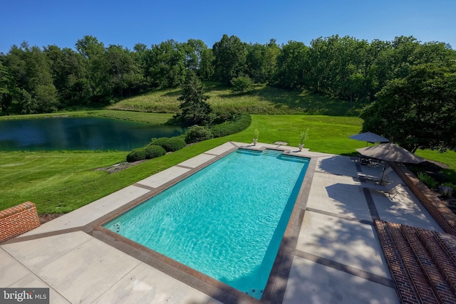 5751 Mount Pisgah Rd, York, PA 17406 - outdoor pool featuring a patio, a water view, and a lawn