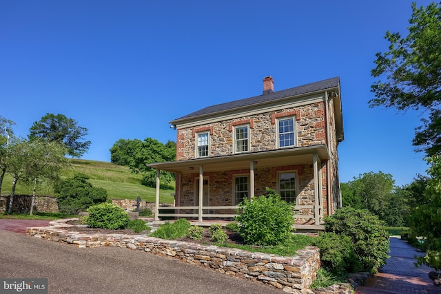 5751 Mount Pisgah Rd, York, PA 17406 - view of front of property featuring a chimney, a porch, and stone siding