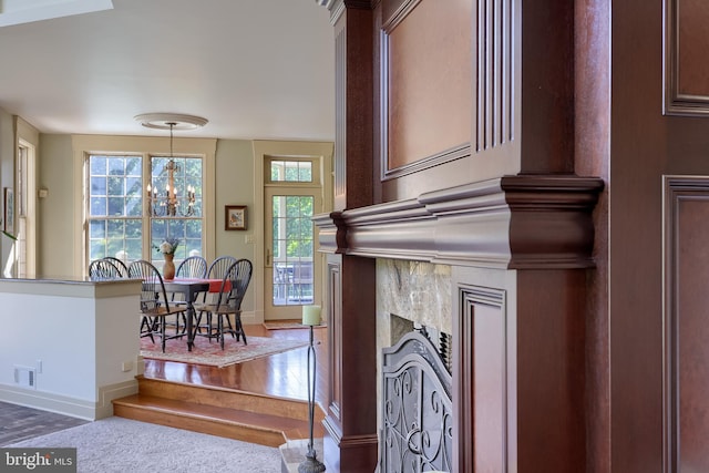5751 Mount Pisgah Rd, York, PA 17406 - interior space featuring a chandelier, a fireplace, and wood finished floors