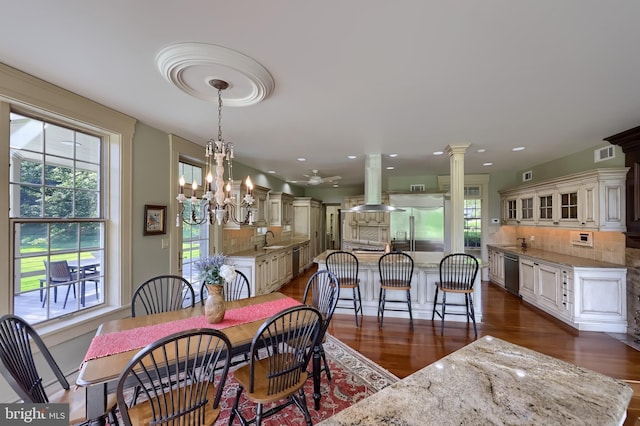 5751 Mount Pisgah Rd, York, PA 17406 - dining space featuring dark wood-style floors, a chandelier, recessed lighting, and decorative columns
