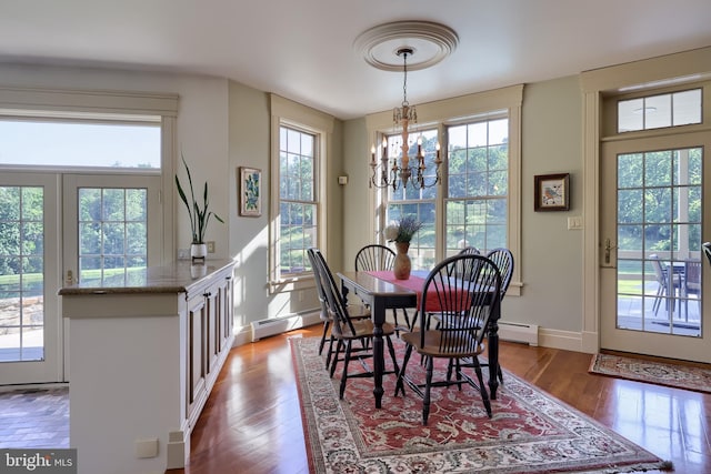 5751 Mount Pisgah Rd, York, PA 17406 - dining space with healthy amount of natural light, baseboard heating, and a chandelier