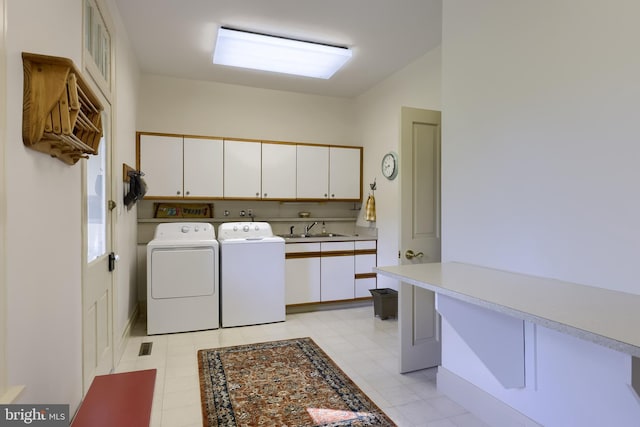 5751 Mount Pisgah Rd, York, PA 17406 - laundry area with cabinet space, washing machine and dryer, and light floors