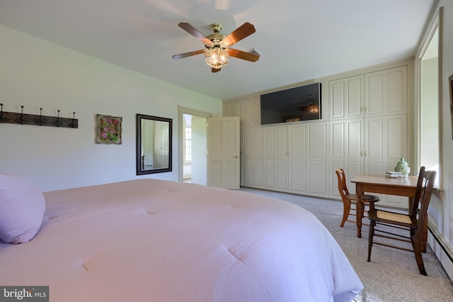 5751 Mount Pisgah Rd, York, PA 17406 - bedroom with light carpet, a baseboard radiator, and a ceiling fan