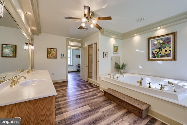 5751 Mount Pisgah Rd, York, PA 17406 - bathroom featuring double vanity, wood finished floors, a garden tub, and ceiling fan