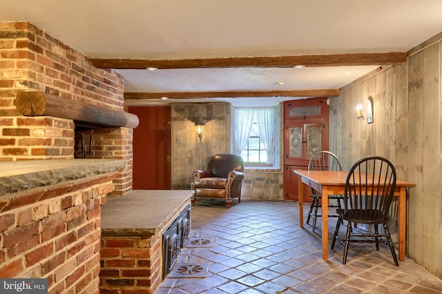5751 Mount Pisgah Rd, York, PA 17406 - dining space featuring wooden walls and beam ceiling