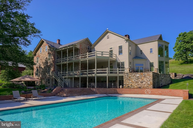 5751 Mount Pisgah Rd, York, PA 17406 - outdoor pool with stairs, a patio area, and a lawn