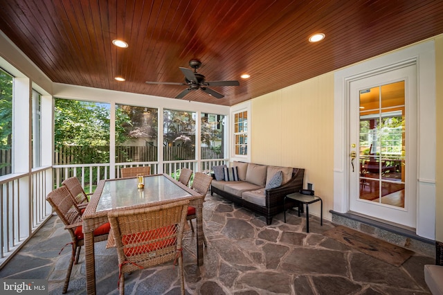 206 E Lake Ave, Baltimore, MD 21212 - sunroom / solarium featuring stone floors, wooden ceiling, outdoor lounge area, ceiling fan, and healthy amount of natural light