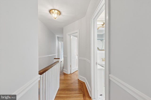 7527 Germantown Ave, Philadelphia, PA 19119 - hall with light wood-type flooring and an upstairs landing