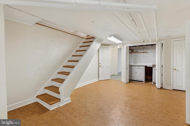 7527 Germantown Ave, Philadelphia, PA 19119 - finished below grade area featuring stairway and light wood-type flooring