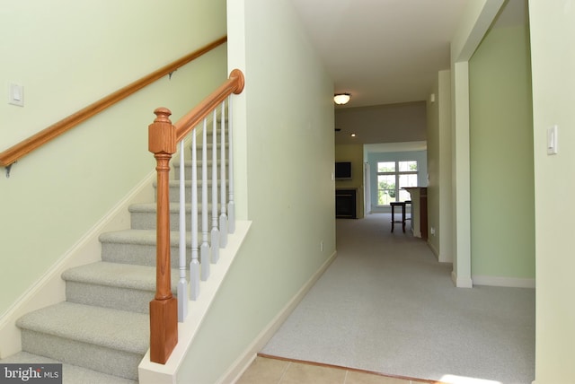 36765 Hummingbird Way N, Selbyville, DE 19975 - stairway with carpet flooring and baseboards