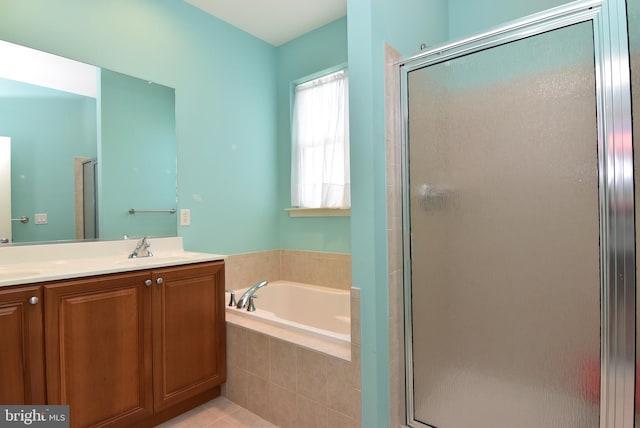 36765 Hummingbird Way N, Selbyville, DE 19975 - full bath with a stall shower, a garden tub, double vanity, and tile patterned flooring