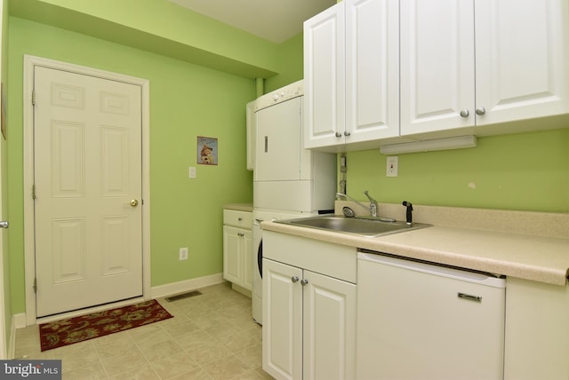 36765 Hummingbird Way N, Selbyville, DE 19975 - laundry room with a sink and stacked washer and clothes dryer