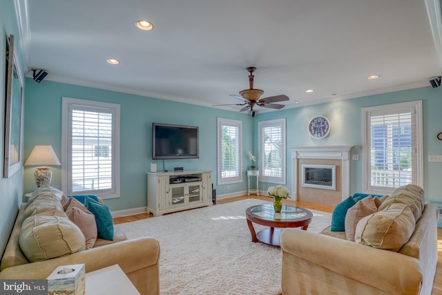 156 E Buckingham Dr, Rehoboth Beach, DE 19971 - living area featuring crown molding, recessed lighting, a premium fireplace, a ceiling fan, and wood finished floors