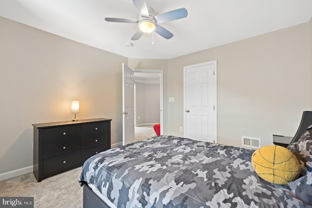 20736 Ashburn Station Pl, Ashburn, VA 20147 - bedroom featuring light colored carpet and ceiling fan