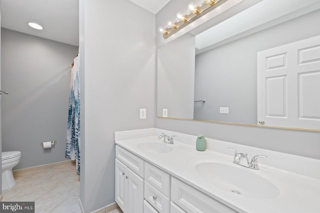 20736 Ashburn Station Pl, Ashburn, VA 20147 - bathroom featuring double vanity, tile patterned floors, and a shower with curtain