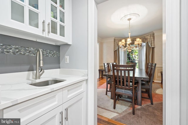 20736 Ashburn Station Pl, Ashburn, VA 20147 - dining area with a chandelier and wood finished floors