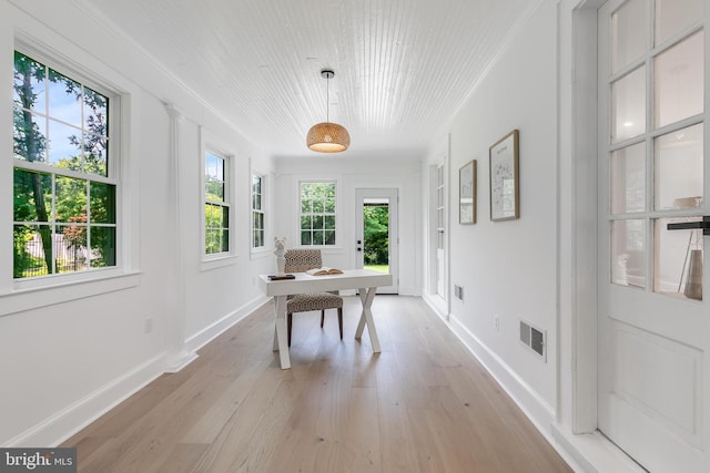 6818 Connecticut Ave, Chevy Chase, MD 20815 - dining space with light wood-style flooring and baseboards