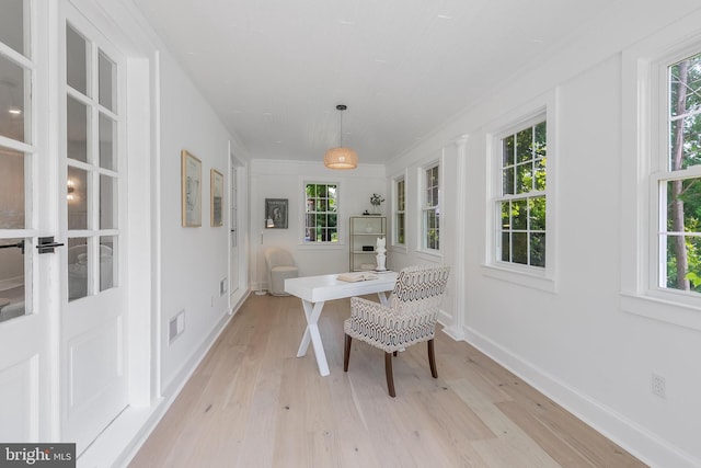 6818 Connecticut Ave, Chevy Chase, MD 20815 - dining area featuring light wood finished floors, ornamental molding, and an office area