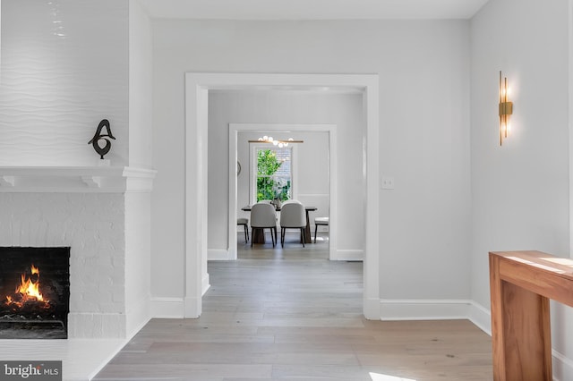 6818 Connecticut Ave, Chevy Chase, MD 20815 - hall featuring light wood-style floors and baseboards