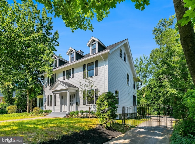 6818 Connecticut Ave, Chevy Chase, MD 20815 - view of front of home with a gate and covered porch