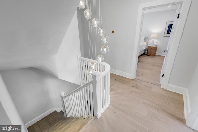 6818 Connecticut Ave, Chevy Chase, MD 20815 - staircase with wood finished floors and vaulted ceiling
