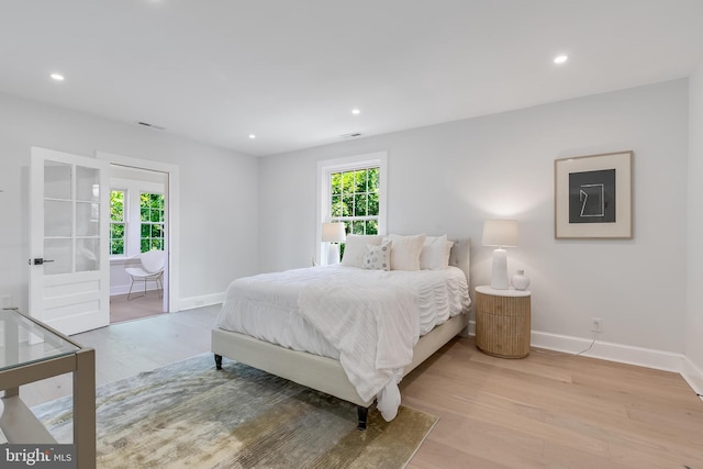 6818 Connecticut Ave, Chevy Chase, MD 20815 - bedroom featuring wood finished floors and recessed lighting