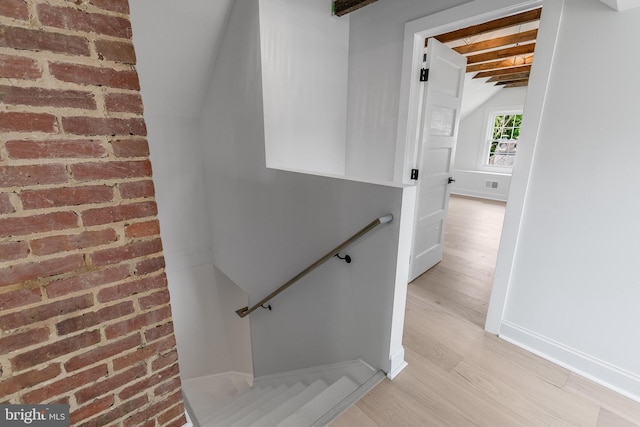 6818 Connecticut Ave, Chevy Chase, MD 20815 - stairway with wood finished floors and lofted ceiling