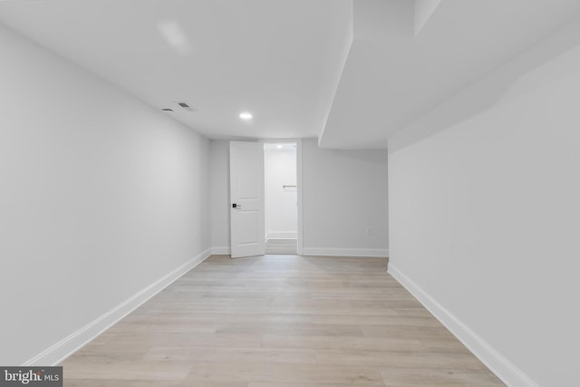 6818 Connecticut Ave, Chevy Chase, MD 20815 - finished basement featuring light wood finished floors and recessed lighting
