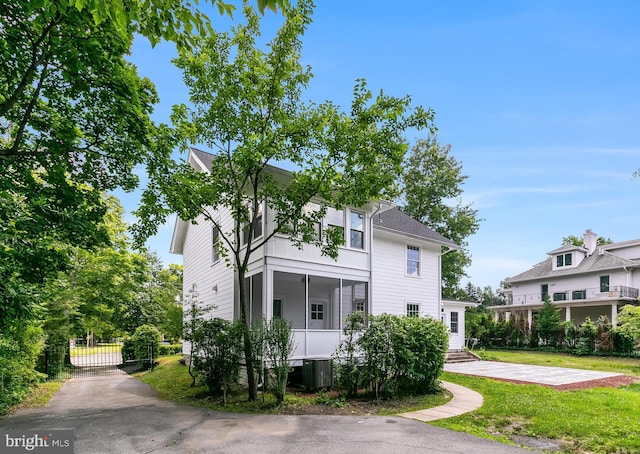 6818 Connecticut Ave, Chevy Chase, MD 20815 - view of front of house featuring a gate and entry steps