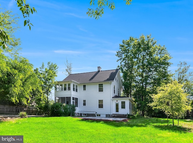 6818 Connecticut Ave, Chevy Chase, MD 20815 - back of property featuring a patio and a chimney
