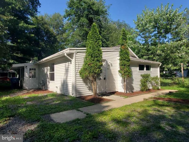 129 Haines St, Browns Mills, NJ 08015 - view of side of property featuring a yard