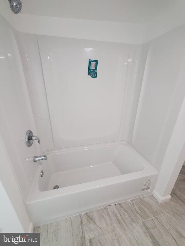 129 Haines St, Browns Mills, NJ 08015 - full bath featuring washtub / shower combination and wood finished floors