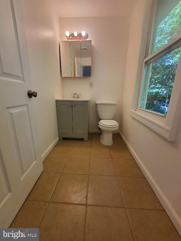 129 Haines St, Browns Mills, NJ 08015 - half bathroom with vanity and tile patterned flooring