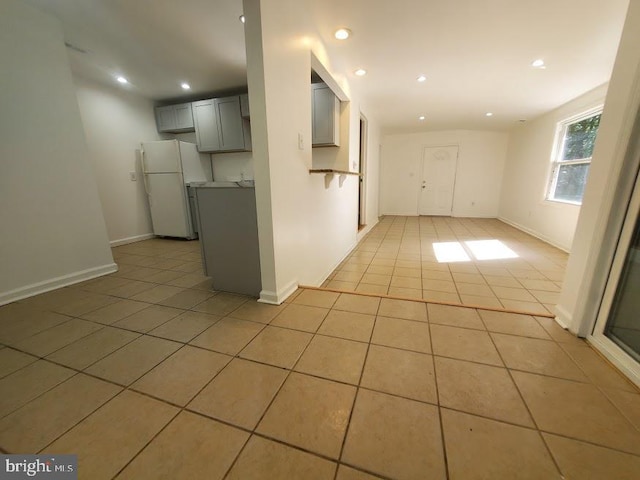 129 Haines St, Browns Mills, NJ 08015 - kitchen featuring freestanding refrigerator, gray cabinetry, light tile patterned floors, recessed lighting, and open floor plan