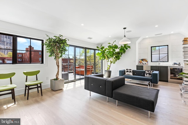 3119 38th St NW, Washington, DC 20016 - living area featuring light wood-style floors, recessed lighting, and vaulted ceiling