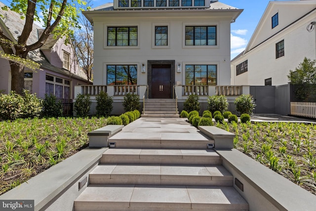 3119 38th St NW, Washington, DC 20016 - view of front of house featuring stucco siding and covered porch