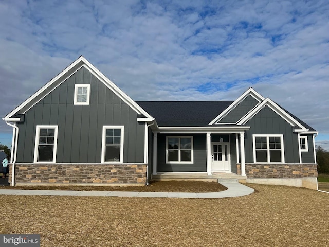 937 Swinehart Rd Unit C, Boyertown, PA 19512 - view of front of property with board and batten siding, stone siding, and a porch