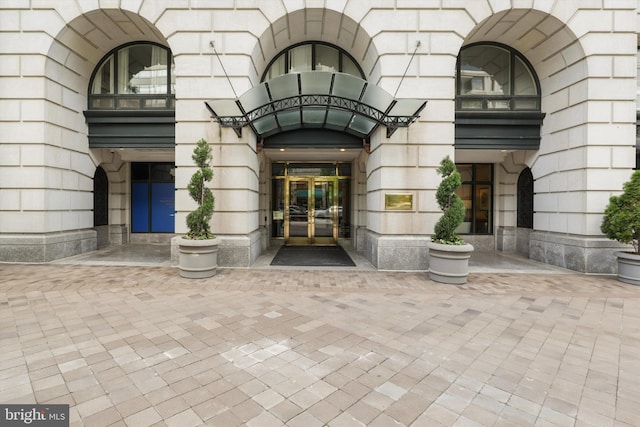 601 Pennsylvania Ave NW Unit 812, Washington, DC 20004 - property entrance featuring stone siding and french doors