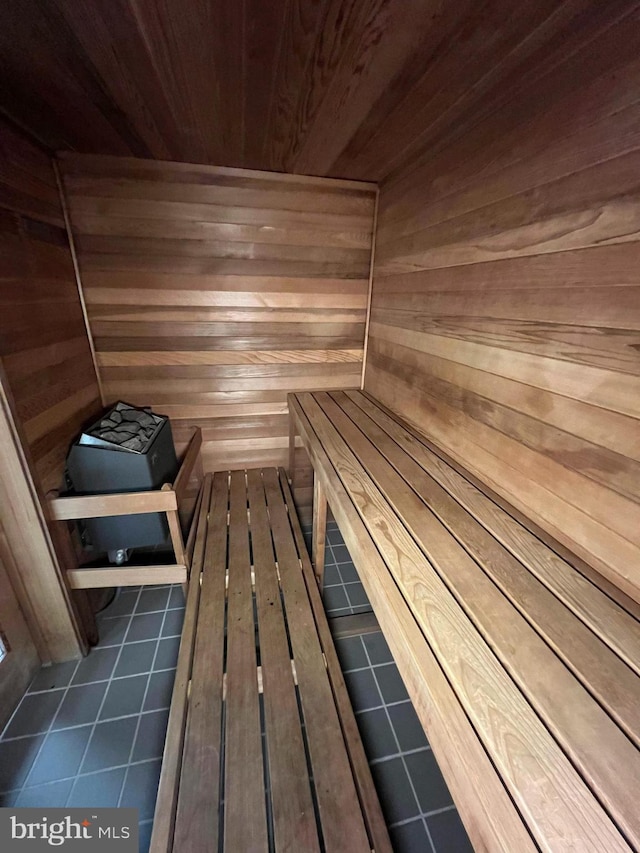 601 Pennsylvania Ave NW Unit 812, Washington, DC 20004 - relaxing sauna with tile patterned floors, wood walls, and wood ceiling