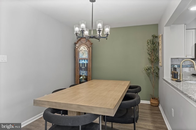 703 Wharton Rd, Mount Laurel, NJ 08054 - dining area with a chandelier and dark wood finished floors