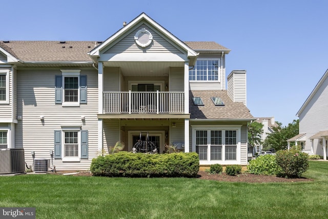 703 Wharton Rd, Mount Laurel, NJ 08054 - rear view of property with a balcony, a lawn, a chimney, and roof with shingles