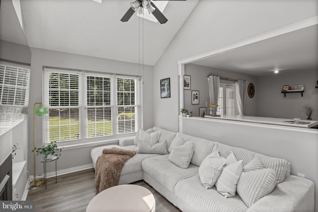 703 Wharton Rd, Mount Laurel, NJ 08054 - living area featuring vaulted ceiling, a ceiling fan, and wood finished floors