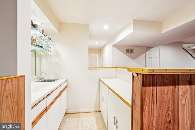 14616 Orangewood St, Silver Spring, MD 20905 - indoor wet bar featuring light flooring and recessed lighting