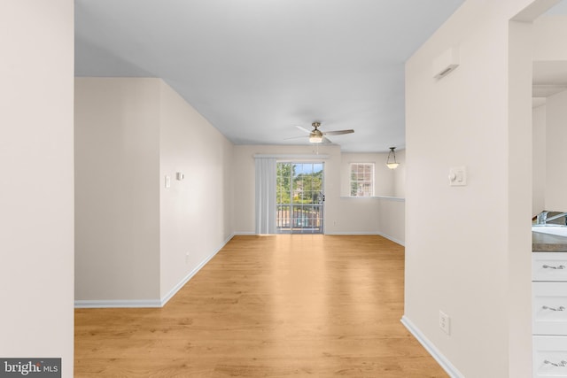 2802B Yarmouth Ln, Mount Laurel, NJ 08054 - unfurnished living room featuring a ceiling fan and light wood-style flooring