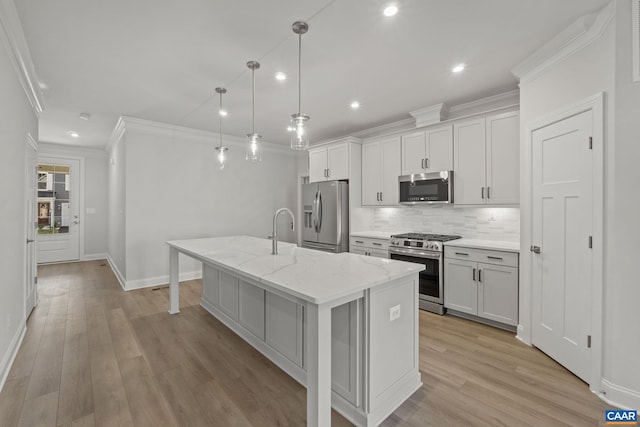 103 Laconia Ln, Charlottesville, VA 22911 - kitchen featuring appliances with stainless steel finishes, backsplash, an island with sink, recessed lighting, and crown molding