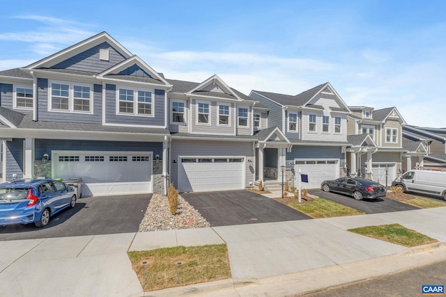 103 Laconia Ln, Charlottesville, VA 22911 - multi unit property with stone siding, driveway, a garage, and a residential view