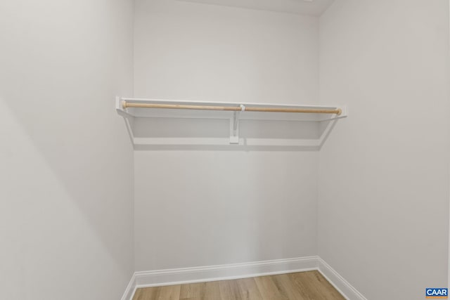 103 Laconia Ln, Charlottesville, VA 22911 - walk in closet with wood finished floors
